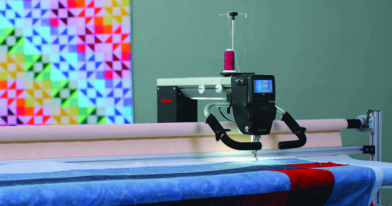 Bernina Q24 with colourful quilt